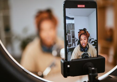 Communication, phone and black woman streaming podcast, radio talk show or speaker talking about te.
